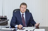 Андрей Иванов за столом